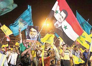 ...Manifestantenan ta mustra bandera di Hezbollah i Siria... 